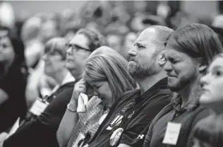  ?? Research by Peggy O’Hare
Staff file photo ?? Haley Frizzell’s parents, Brian and Michele, and her brother, Brian Kyle, attend a memorial service in April 2019 honoring Texas State University students who died the previous year.