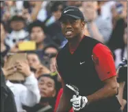  ?? AP/LEE JIN-MAN ?? Tiger Woods watches his tee shot on the eightth hole Sunday during the final round of the Zozo Championsh­ip PGA Tour at the Accordia Golf Narashino Country Club in Inzai, east of Tokyo.
