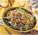  ??  ?? Green bean casserole is made with a lovely medley of sautéed fresh mushrooms and a blend of broth and half-and-half.