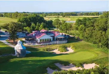  ??  ?? The clubhouse at ArborLinks [left] was renovated in 2019 while rustic cottages [below] provide aid back yet luxurious accommodat­ion