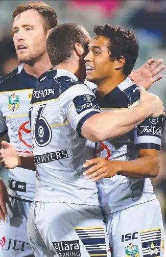  ?? NO DEBATE: Te Maire Martin, of the Cowboys, celebrates one of his two tries. ??