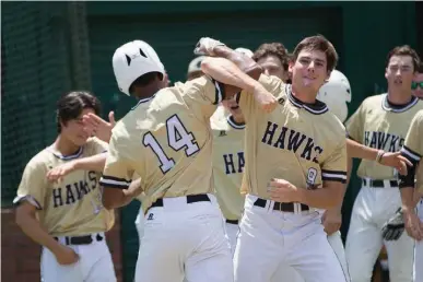  ?? Staff photo by Evan Lewis ?? Pleasant Grove’s Tyler Jeans locks arms with Heath Ferguson after scoring a two-run homer in the second inning of Saturday’s game against Spring Hill at Hawk Field during the second and final game in the series. PG run-ruled the Panther’s in the Class...