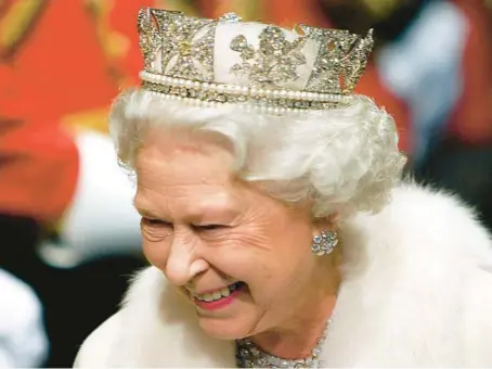  ?? TOBY MELVILLE/AP ?? Queen Elizabeth II smiles during the 2007 opening of Parliament at the House of Lords in London. The queen died Thursday in Scotland.