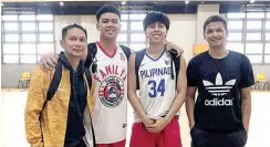  ?? (Photo from Jovie Laure's Facebook account) ?? UNIVERSITY OF SANTO TOMAS recruits Kenji Duremdes (second from right) and Echo Laure (second from left) pose with Tigers head coach Bal David (left) and assistant Rodney Santos.