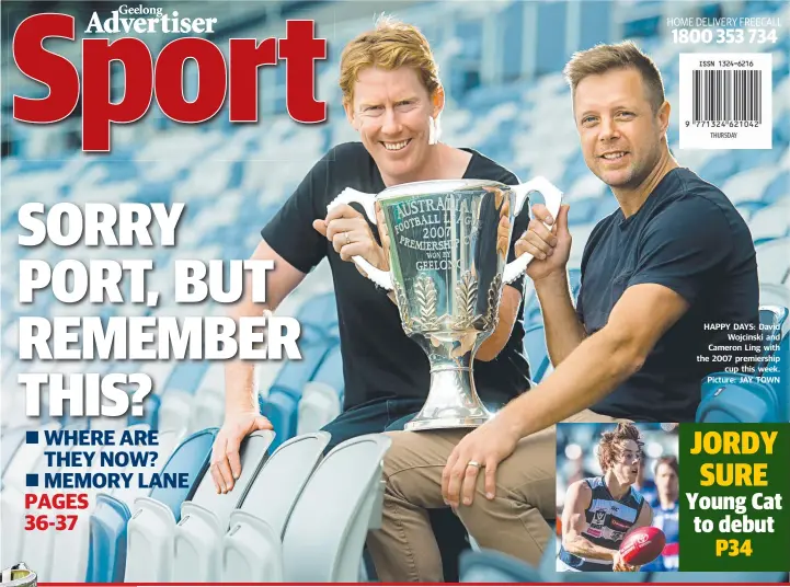  ??  ?? HAPPY DAYS: David Wojcinski and Cameron Ling with the 2007 premiershi­p cup this week. Picture: JAY TOWN