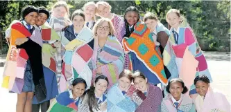  ?? ?? ST MARY’S Diocesan School for Girls and NPO 67 Blankets for Nelson Mandela Day held a blanket handover this week. Grouped around teacher Tracy Laubscher in the centre are, back from left, Mikhenso Serafim, Nomakhwezi Mtetwa, Isabelle Meyer, Gabriella Pugh, Tahlita Birdsey, Shannon Hugo, Khulile Nxumalo, Sarah Fly and Hadassah Birdsey, and in front, Latika Singh, Gabriella Ancillotti, Georgia Main, Caitlin McGlynn, Asemahle Dubula and Sithandiwe Nkuku. | SHELLEY KJONSTAD African News Agency (ANA)