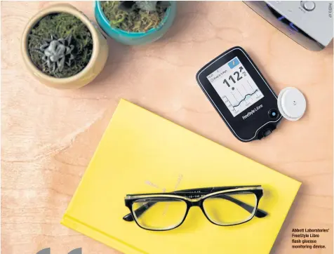  ??  ?? Abbott Laboratori­es’ FreeStyle Libre flash glucose monitoring device.