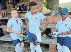  ?? ?? GETTING GEARED: U13s Ethan de Wet, Ibenathi Kondile and Lilitha Gobane padding up for their match against Shaw Park