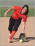  ??  ?? Portervill­e College shortstop Shantae Gutierrez fields a ground ball during practice.