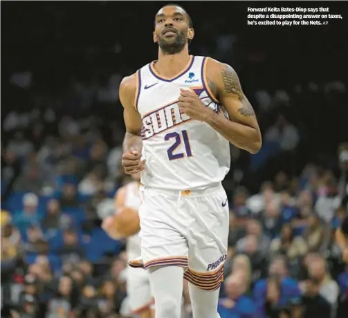  ?? AP ?? Forward Keita Bates-Diop says that despite a disappoint­ing answer on taxes, he’s excited to play for the Nets.