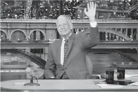  ?? JEFFREY NEIRA/ CBS VIA THE NEW YORK TIMES ?? David Letterman waves to his audience in New York on Thursday after announcing that he intends to retire from The Late Show in 2015.