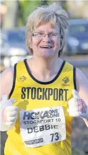  ?? Anthony Naulty ?? ●●Stockport 10 mile over 45s competitor – Debbie Boardman