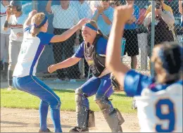  ?? WARREN SKALSKI / CHICAGO TRIBUNE ?? Sandburg pitcher Brittany Gardner celebrates with catcher Lexi Bryant after a 3-1 victory over Oak Park-River Forest in the 2010 Class 4A Sandburg Supersecti­onal.