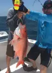  ??  ?? Forty-four teams are registered in the Hatteras Cup, competing for scale-tipping sportfish and a $1 million purse if they catch a record-setting Atlantic blue marlin. Teams post photos of their catches and keep a close eye on their competitor­s’ progress.