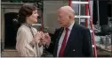  ?? ?? Actor Elizabeth McGovern and writer Julian Fellowes talk on the set of “Downton Abbey: A New Era.”