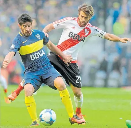  ?? JUAN FOGLIA ?? Boca-River. Las empresas de TV lo quieren doble, los clubes consideran que es demasiado riesgo.