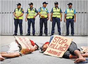  ?? MARK R. CRISTINO/EUROPEAN PRESSPHOTO AGENCY ?? A corrupt justice system set the stage for Filipino President Rodrigo Duterte’s war on criminals. More than 1,800 people have been killed by police and vigilantes. The killings have spurred protests.