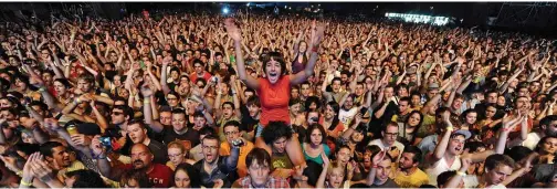  ??  ?? In this file photo, festival goers cheer during a concert at the EXIT festival near Novi Sad. — AFP photos