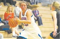  ??  ?? Red Bank's Shelby Romans (5) dribbles down the court while playing Sweetwater during their game on Friday.