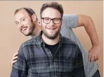  ?? CHRIS PIZZELLO/THE CANADIAN PRESS ?? Evan Goldberg, left, and Seth Rogen acknowledg­ed the honour with a video spoof of The Red Green Show.