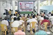  ?? PTI ?? AIADMK workers watch election results at the party headquarte­rs in Chennai on Sunday.