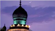  ?? — P.Surendra ?? The crescent moon rises over Charminar on Friday. Id-ul-Fitr will be celebrated in Telangana state and Andhra Pradesh on Saturday. DC wishes all its readers Id Mubarak