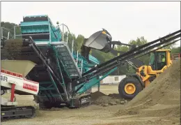  ?? Brian Pounds / Hearst Connecticu­t Media file photo ?? Gravel and top soil are separated at the new Burns Constructi­on property at 16 Riverside Drive in Ansonia in 2019.