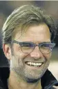  ??  ?? IT’S ALL SMILES AT THE KOP: Jurgen Klopp has turned Liverpool’s fortunes around