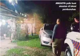  ??  ?? ANGGOTA polis buat siasatan di lokasi
pembunuhan.