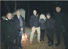  ?? (Yitzhak Eldan) ?? YITZHAK ELDAN, second from left, with Israeli high school students and friends at Hyde Park following the lighting of the hanukkiah.