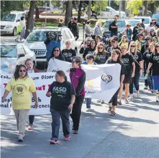  ?? BRANDON HARDER ?? A group of people took to the streets to mark Internatio­nal FASD Awareness Day. They hope removing the stigma around Fetal Alcohol Spectrum Disorder will encourage parents to get help early.