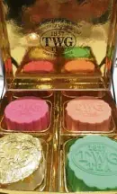  ?? —RAOULJ. CHEE KEE ?? Snowskin mooncakes from TWGTea contain tea-infused white or brown lotus seed paste, and are covered in a mochi-like crust.
