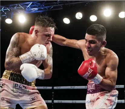  ??  ?? Kash Farooq, right, suffered a contentiou­s points defeat to Lee McGregor that cost him the British title