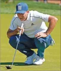  ?? AP - John Raoux ?? Sergio Garcia lines up a putt on the fifth hole during the first round of The Players Championsh­ip on Thursday.