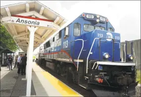  ?? Hearst Connecticu­t Media file photos ?? The Waterbury line Metro-North train pulls through the Ansonia train station in July 2018.