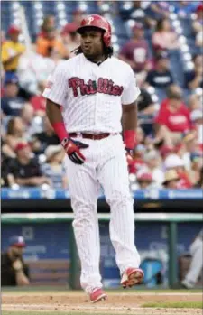  ?? CHRIS SZAGOLA — THE ASSOCIATED PRESS ?? Phillies’ Maikel Franco Pirates last year. reacts during a game against the