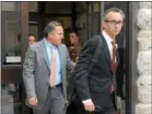  ?? TANIA BARRICKLO — DAILY FREEMAN FILE ?? Gilberto Nunez, center, and defense attorney Evan Lipton, foreground, leave the Ulster County Courthouse in Kingston earlier this week.