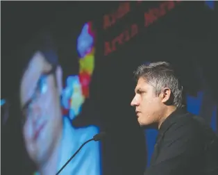  ?? JOHN KENNEY FILES ?? Armin Morattab pauses as he speaks of his brother Arvin during a vigil in Montreal on Jan. 19 to commemorat­e the victims of a passenger plane shot down by Iranian Revolution­ary Guard missiles.