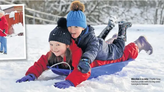  ??  ?? Hitchin’s a ride Charlie Gray hitches a ride with his big sister Georgia in Kinross