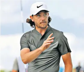  ??  ?? Pride of England: Tommy Fleetwood reacts after making a birdie on the ninth