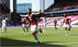  ??  ?? Aston Villa’s Mahmoud Trezeguet celebrates his second goal in the 2-0 win against Crystal Palace. Photograph: Marc Aspland/Marc Aspland NMCPool