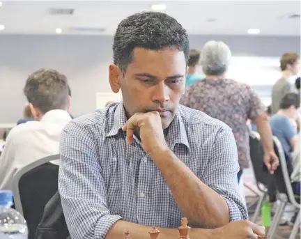  ?? Photo: NZ Chess ?? CM Manoj Kumar in round two of the 2017 Oceania zonal in Auckland, New Zealand.
