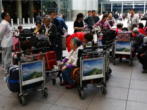  ?? (Reuters) ?? Heathrow Terminal 5 was described as having ‘wall to wall queues’