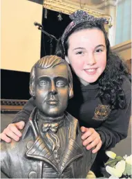  ??  ?? Rabbie the bronze Tarbolton’s Hannah Grant performed ‘ Tae a Scotch Pie’