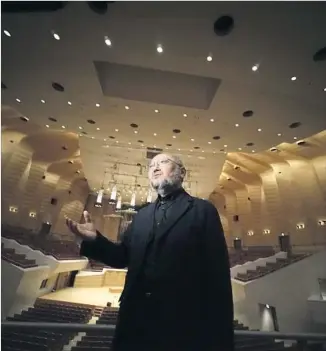  ?? Eugene Hoshiko Associated Press ?? ACOUSTICIA­N Yasuhisa Toyota discusses his work at the vineyard-style Suntory Hall in Tokyo.