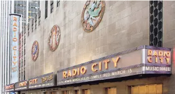  ??  ?? The 50th Street facade of Radio City Music Hall features three metal- and- enamel medallions by Hildreth Meière, perhaps her most well- known commission. Below, Meière’s “Dance” relief sculpture on the outside of Radio City Music Hall.