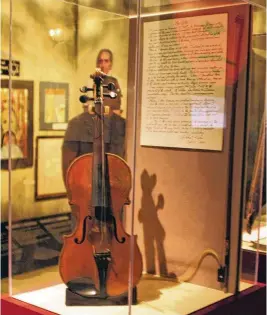  ?? MUSEUM OF THE U.S. AIR FORCE / CONTRIBUTE­D ?? Bob Kahn’s violin, which he was forced to play as Nazis beat his father, is on exhibit at the National Museum of the U.S. Air Force.