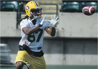  ?? JOHN LUCAS/ EDMONTON JOURNAL ?? Edmonton Eskimos wide receiver Derel Walker, shown working during Monday’s practice, made 10 catches for 125 yards in his CFL debut against the Montreal Alouettes last week.