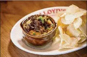  ?? CONTRIBUTE­D BY MIA YAKEL ?? LLoyd’s Spinach Dip Appetizer with classic Ruffles potato chips.