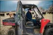  ?? NATHAN BURTON/Taos News ?? Taos Rancher John Adams checks on his cattle early Tuesday (April 4).